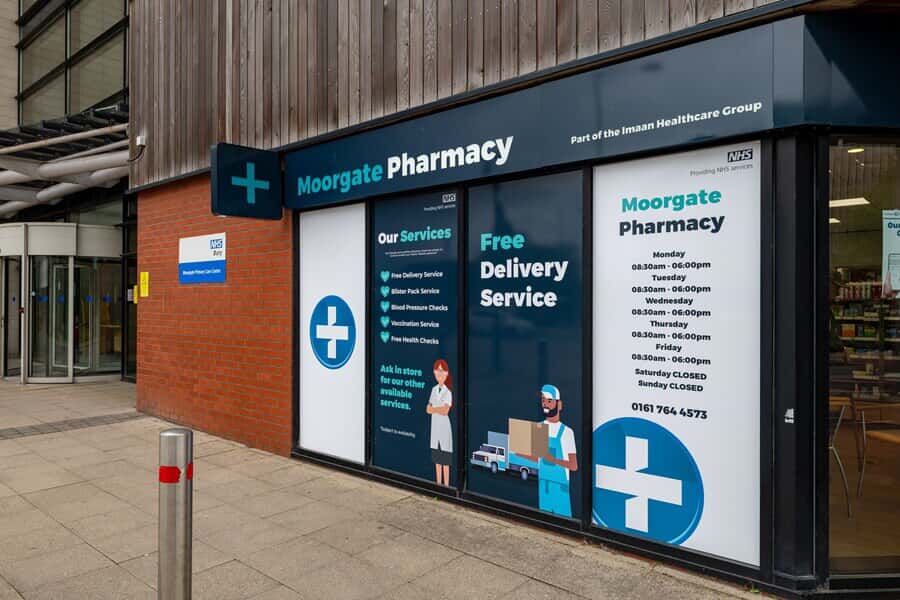 An image of the exterior Moorgate Pharmacy signage and window graphics.